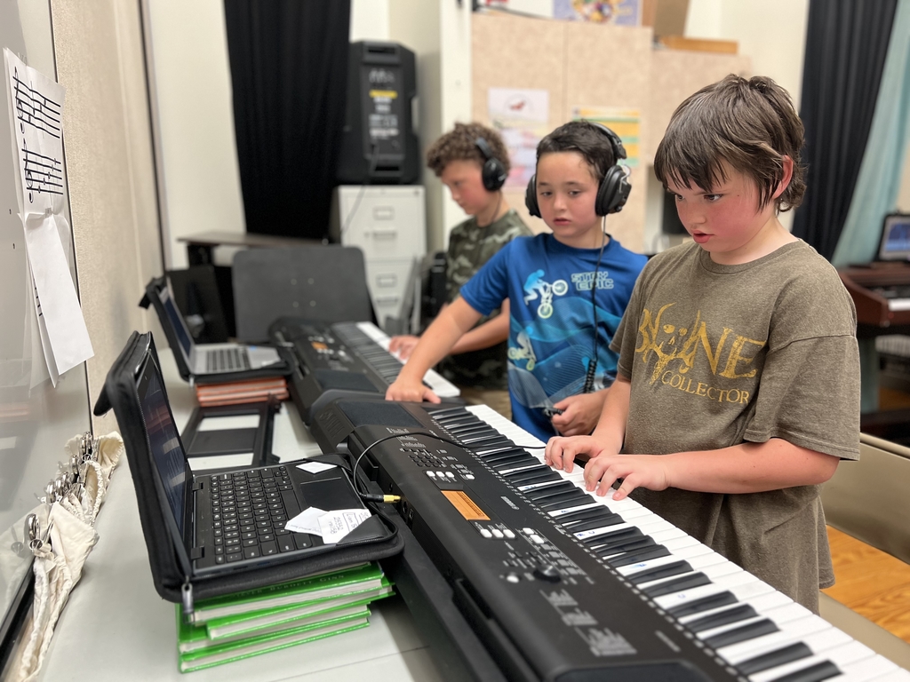 3rd Graders learning piano