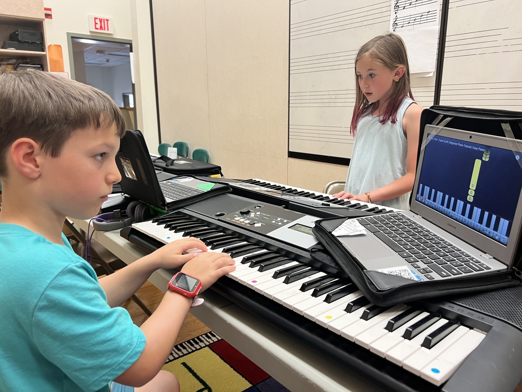 3rd Graders learning piano