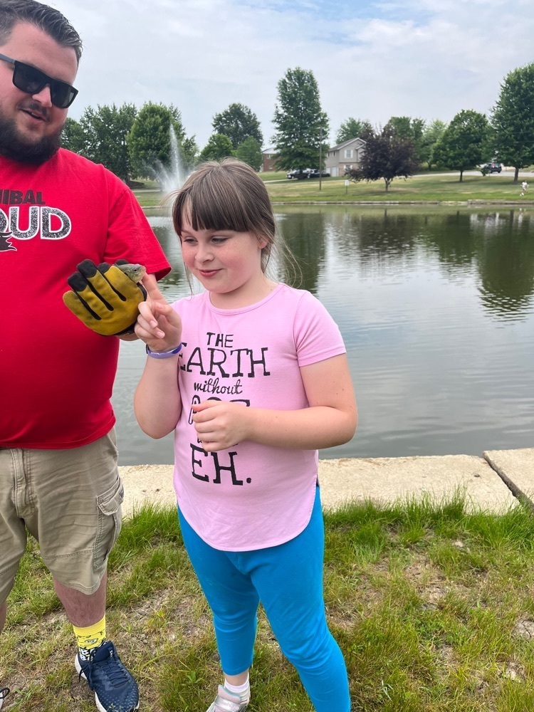 student catching a fish