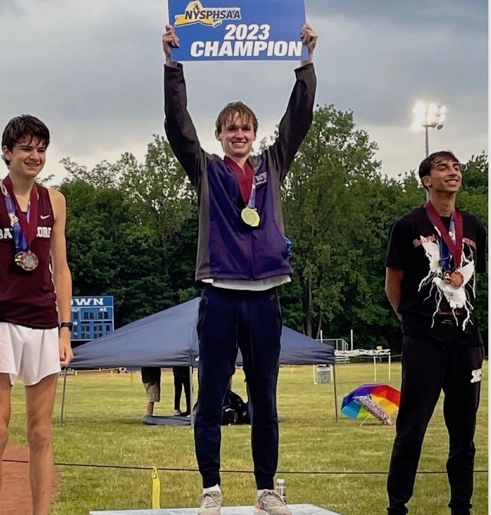 Colin Gilstrap with championship sign