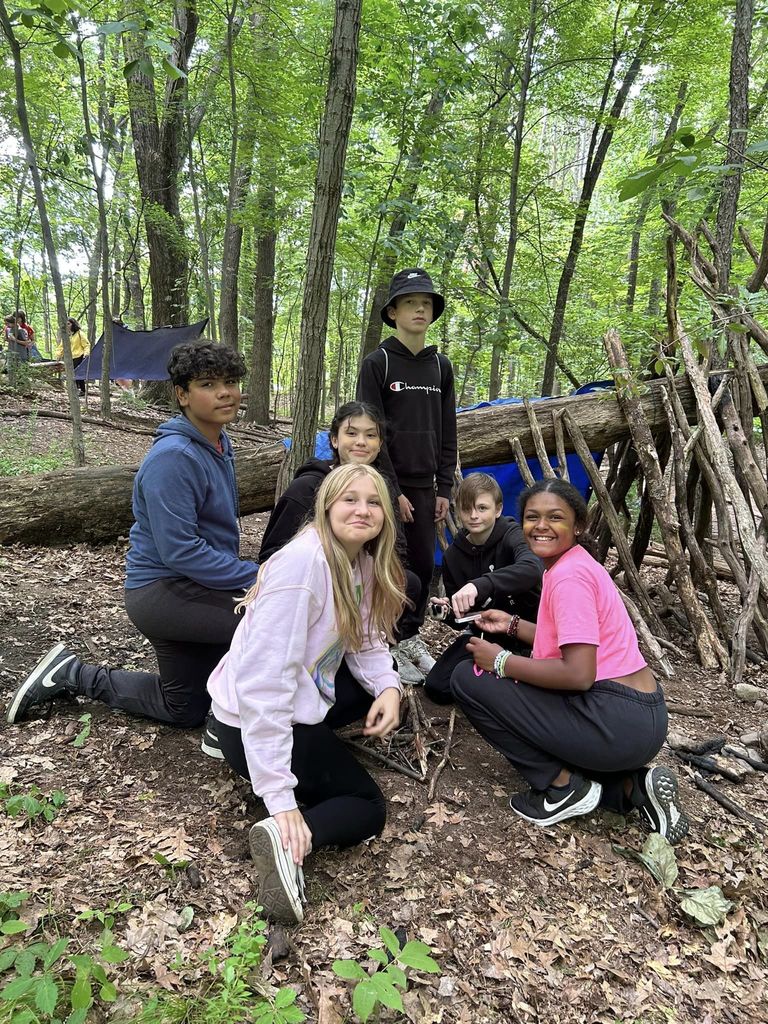 students build a fire