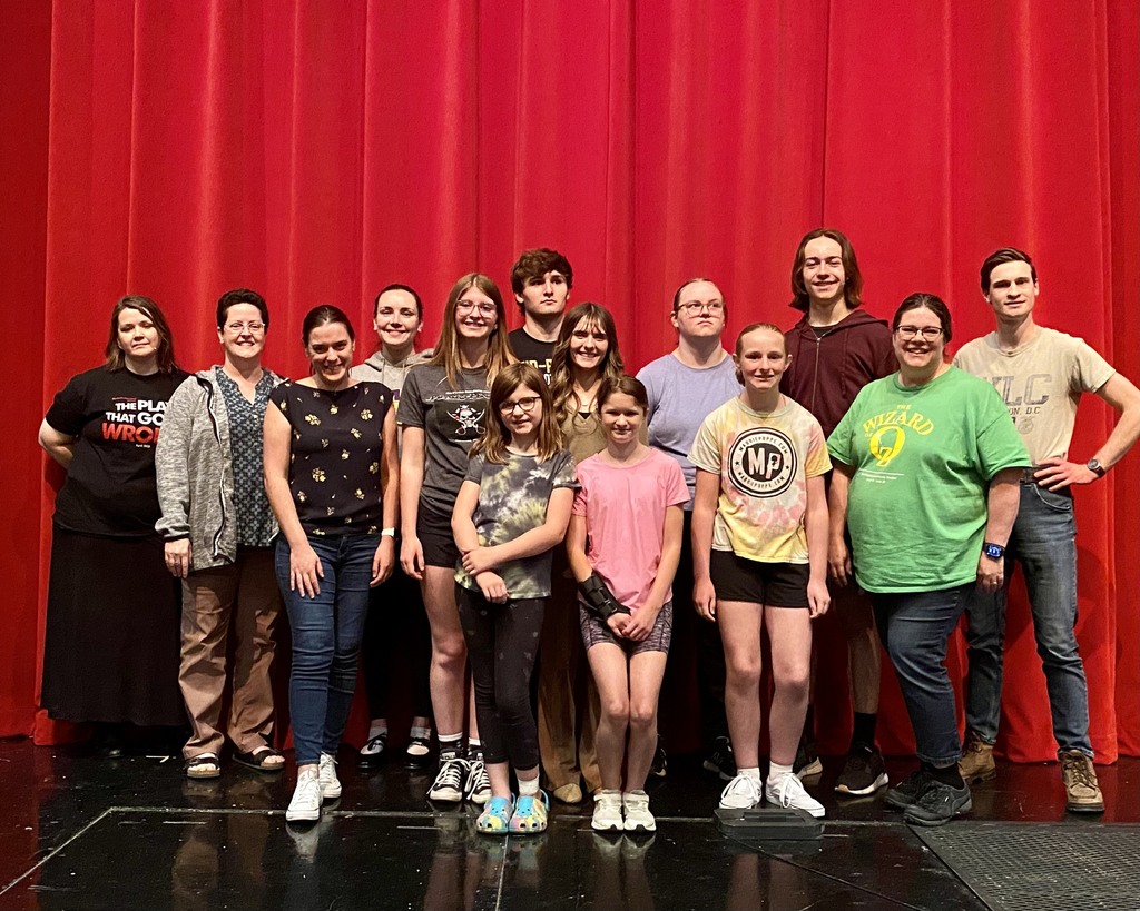 Following the Yellow Brick Road from Mid-Prairie to Oz are - Front row, l-r: Jenna Puttmann, Samantha Pickard, Lara Brenneman, Christine Meader. Back row: Lisa Helmuth, Collette McClellen, Megan Yoder, Abby Altenhofen, Grace Puttmann, Jack Greiner, Drea McCain, Isabelle Duvall, Haydon Bailey, Evan Meader.