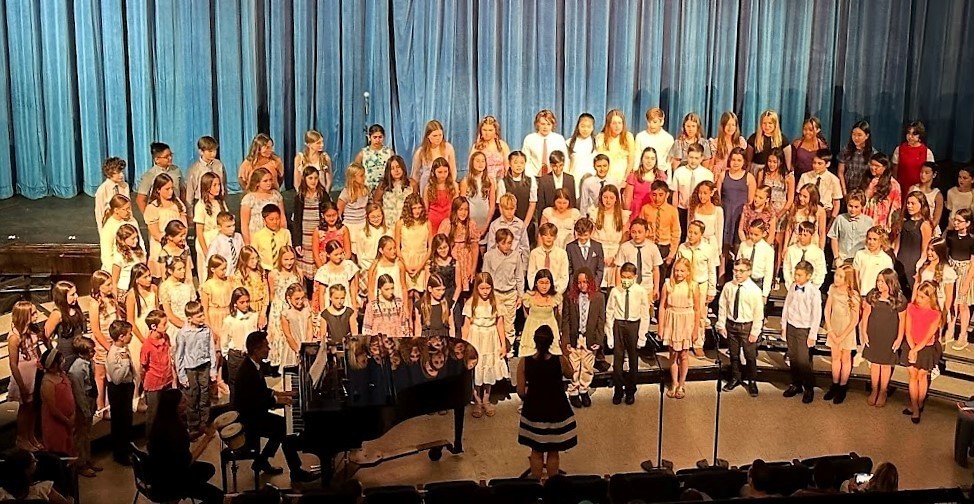 All City chorus performs on stage