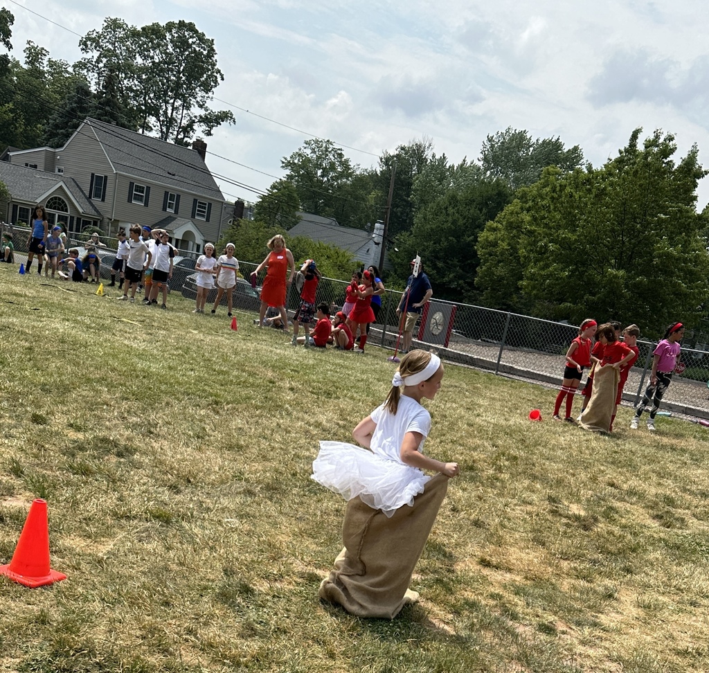student doing sack race
