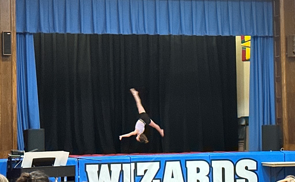 5th grade student flipping during Variety Show