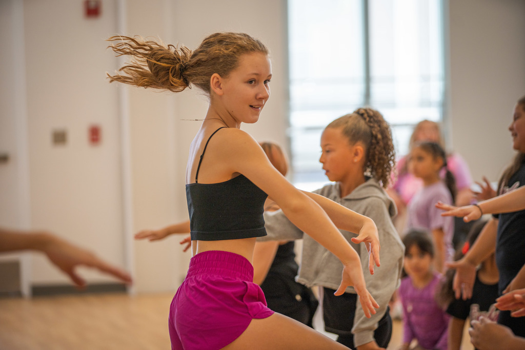 female student in the middle of a spin in Youth Dance League