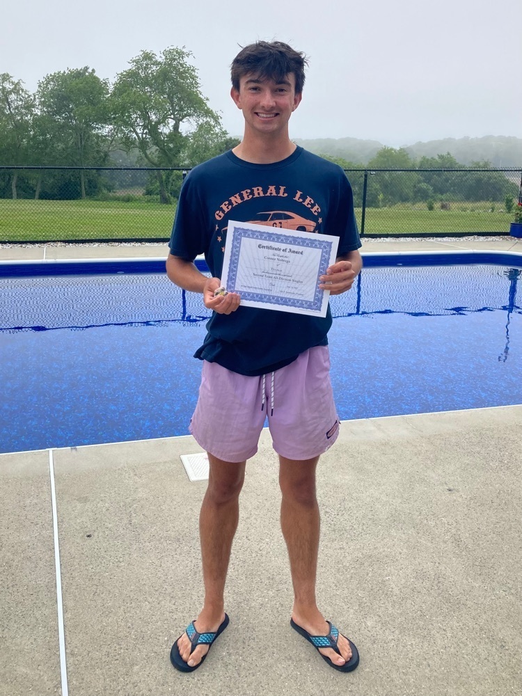 All Division award winner poses with certificate