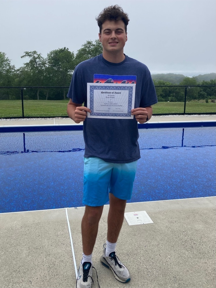 All Division award winner poses with certificate