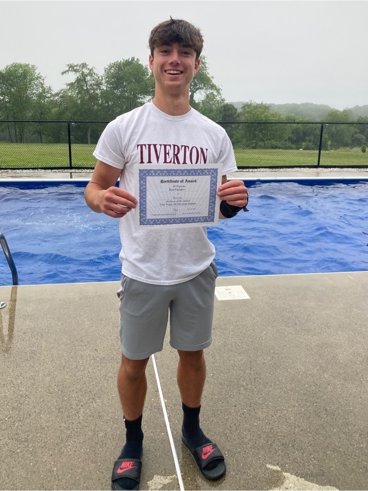 All Division award winner poses with certificate