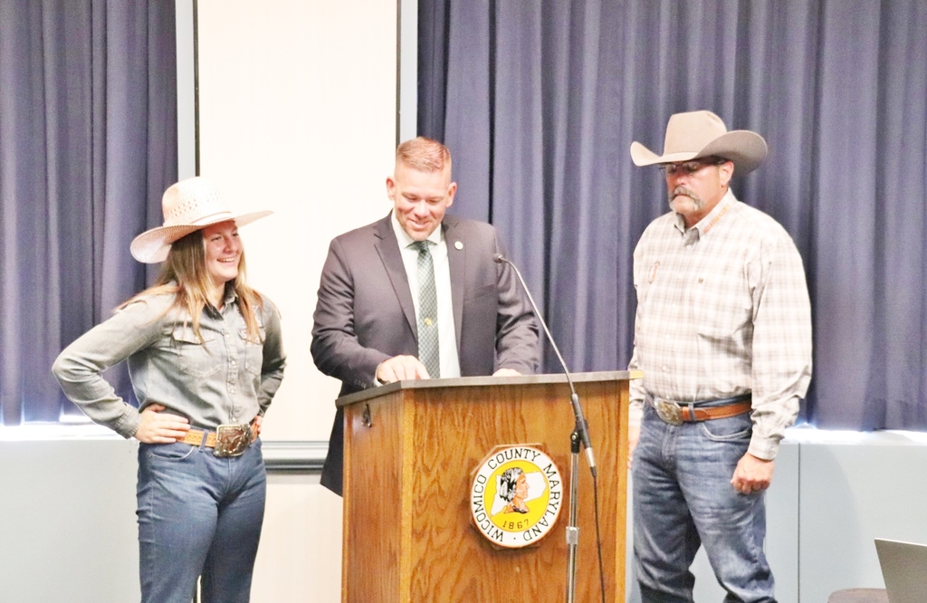 Wicomico County Councilman Shane Baker reads proclamation to Claire Lewis