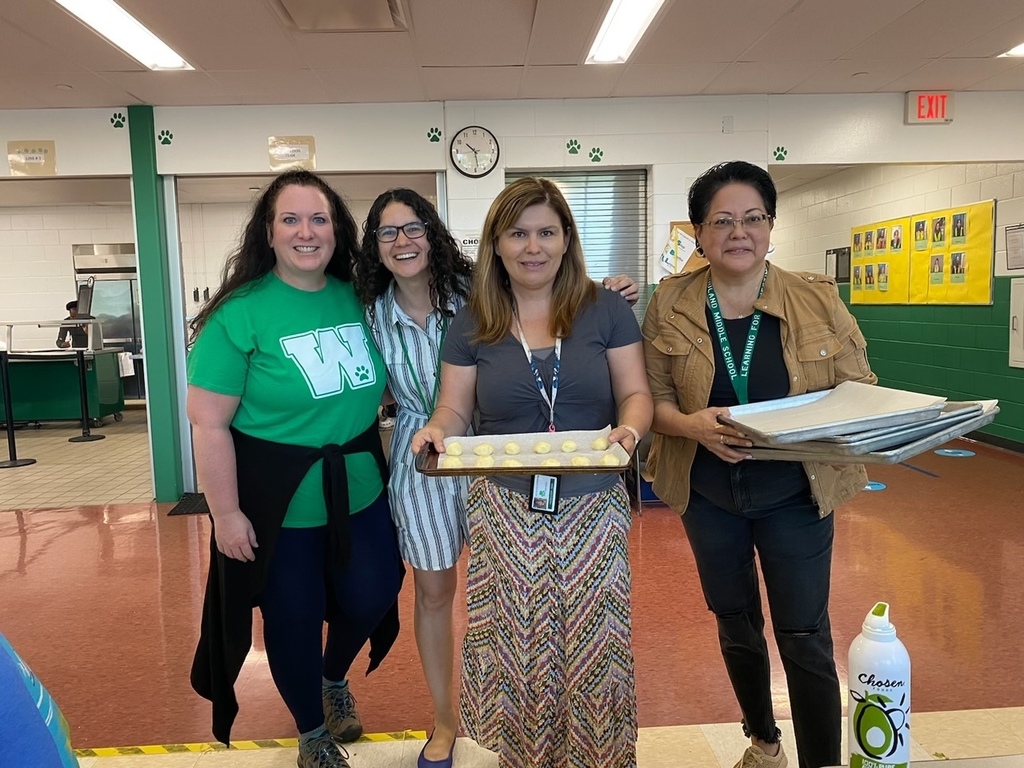 Four Woodland Teachers help students bake at summer school