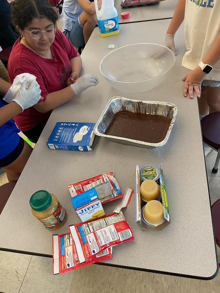 Students gather ingredients for baking