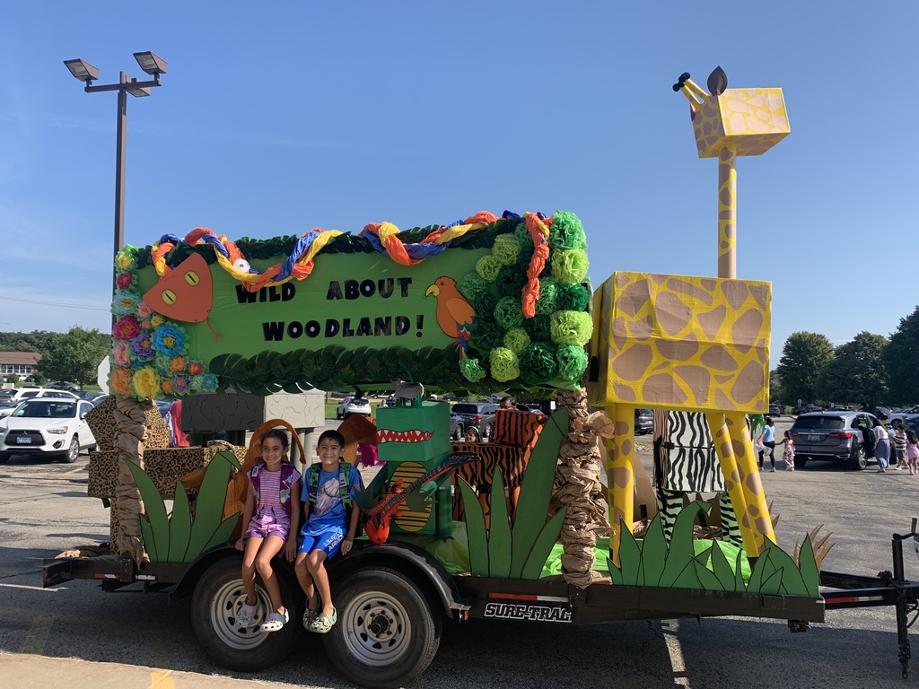 Woodland Zoo float with animals created by staff members and district families