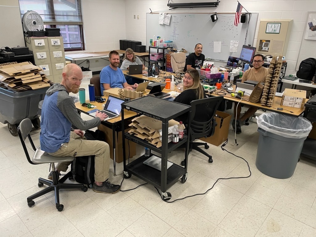 Technology Team preparing student Chromebooks for the start of school