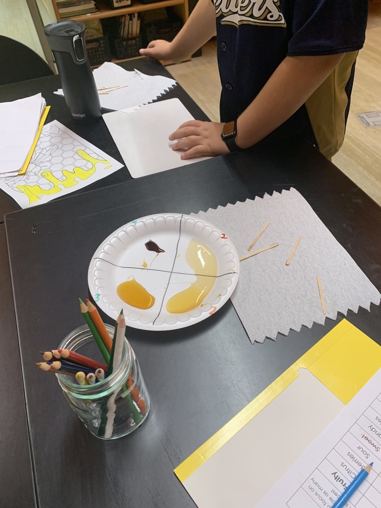 Student testing different kinds of sweet nectars.