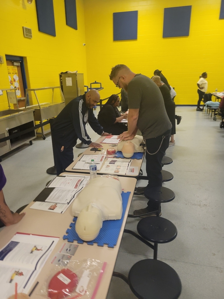 People in Various stages of practicing CPR during CPR Training