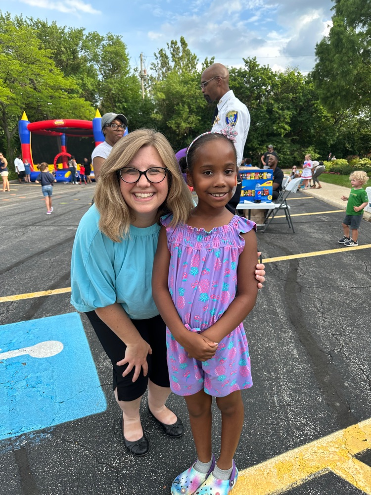 Principal and student at National Night Out 