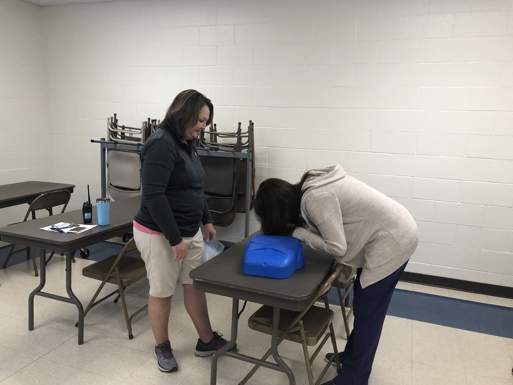 Faculty doing CPR