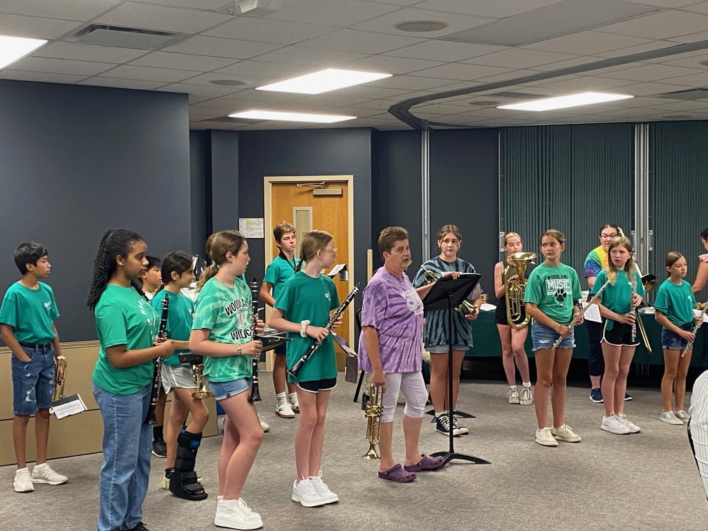 WMS Band kicks off a meeting with a surprise performance