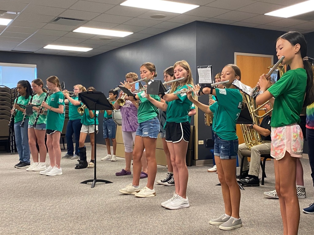 WMS Band kicks off a meeting with a surprise performance
