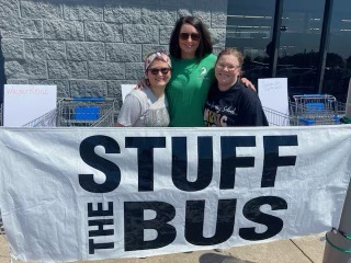 ladies with banner