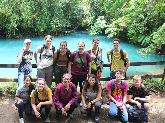 Group photo by the water