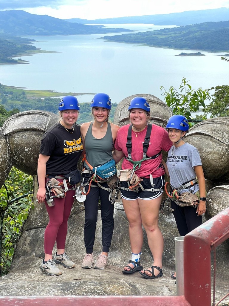 4 students ready to go ziplining
