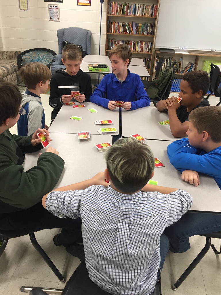 Students playing apples to apples