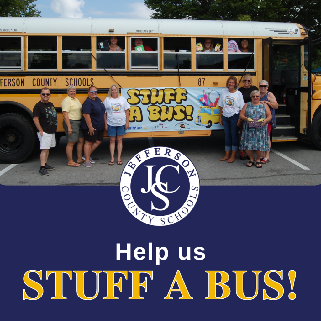 "Help us Stuff a Bus!" message with photo of JCS bus drivers in front of school bus with Stuff-a-Bus banner