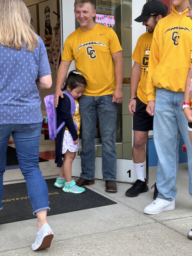 Cheerleaders welcome students