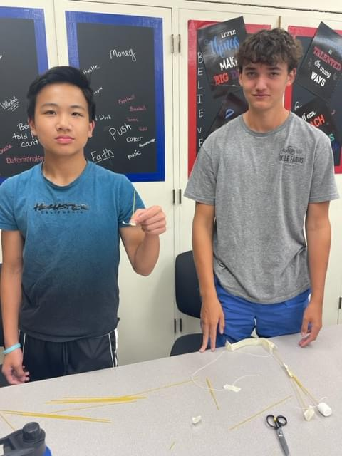 Students enjoy teambuilding activities during 8th grade Intro. to Business with Mrs. Lindstrom. #HMSRedHawks 