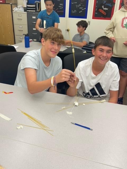 Students enjoy teambuilding activities during 8th grade Intro. to Business with Mrs. Lindstrom. #HMSRedHawks 