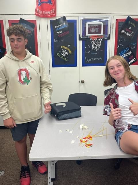 Students enjoy teambuilding activities during 8th grade Intro. to Business with Mrs. Lindstrom. #HMSRedHawks 