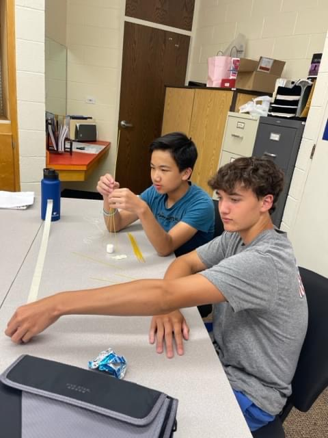 Students enjoy teambuilding activities during 8th grade Intro. to Business with Mrs. Lindstrom. #HMSRedHawks 