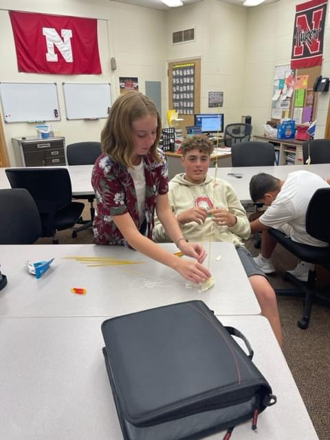 Students enjoy teambuilding activities during 8th grade Intro. to Business with Mrs. Lindstrom. #HMSRedHawks 