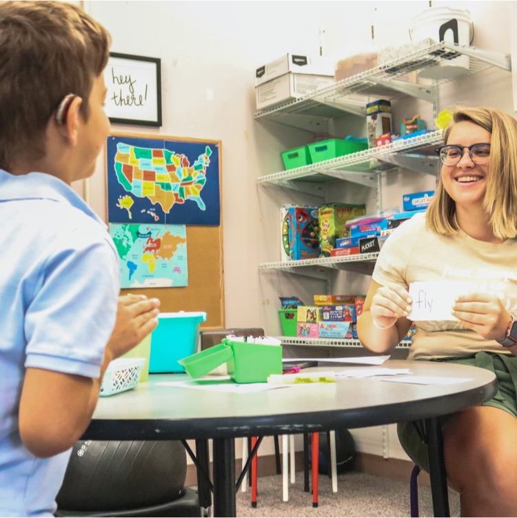 teacher and student working together