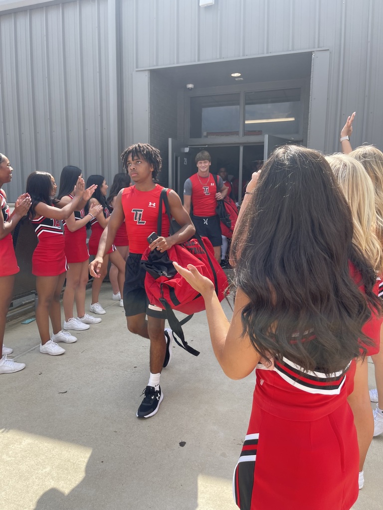 Legacy varsity cheer sending off Tyler Legacy football before the first game in Lufkin.