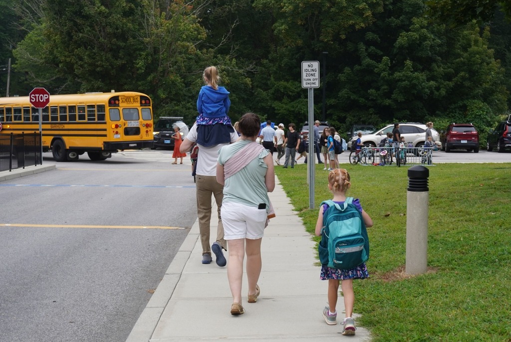 family walking to school