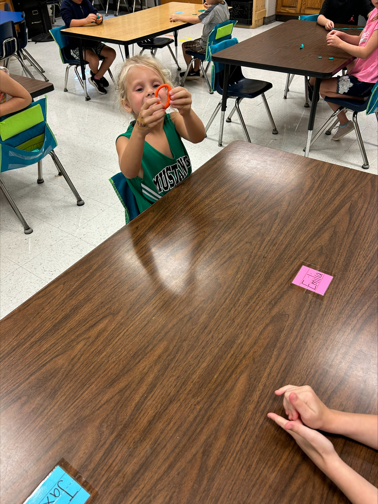 child showing off circle