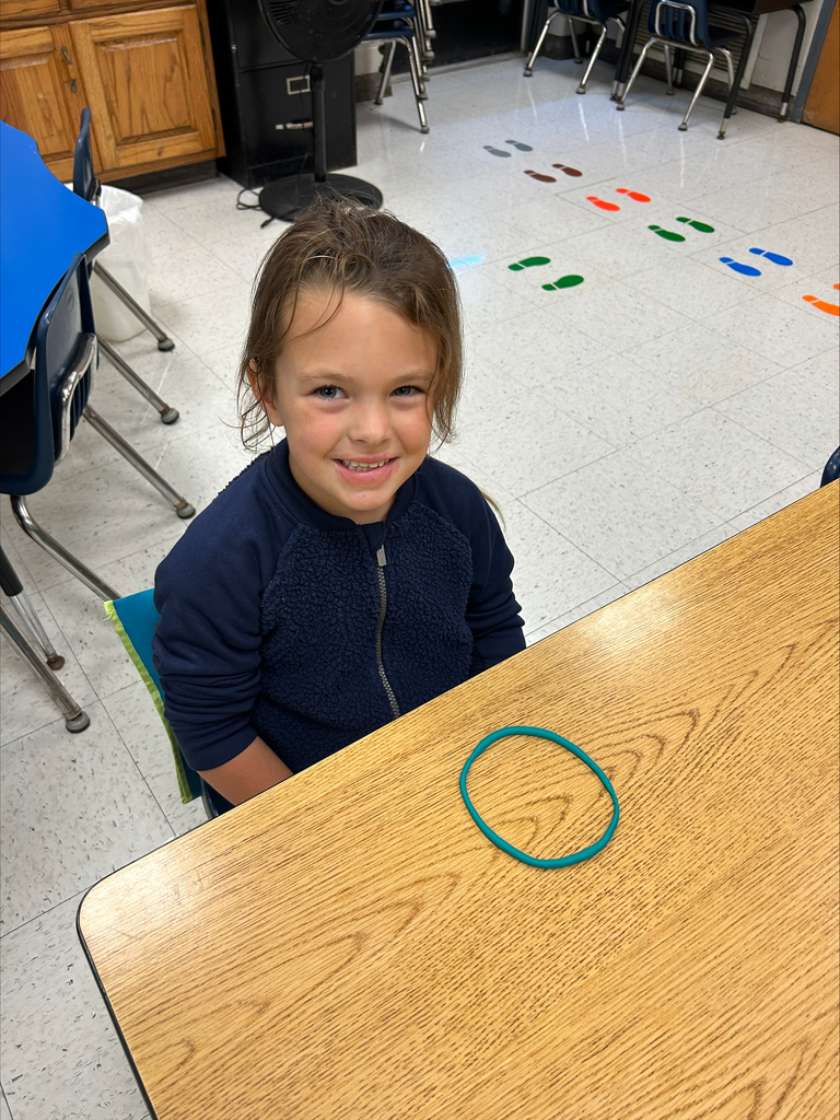 child with large circle