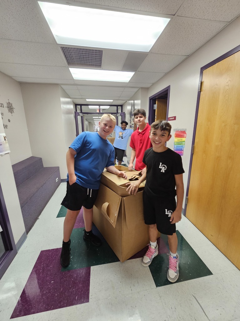 BMS students moving boxes