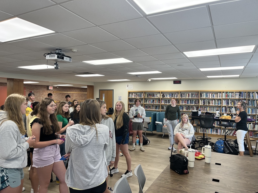 Students meeting in the library