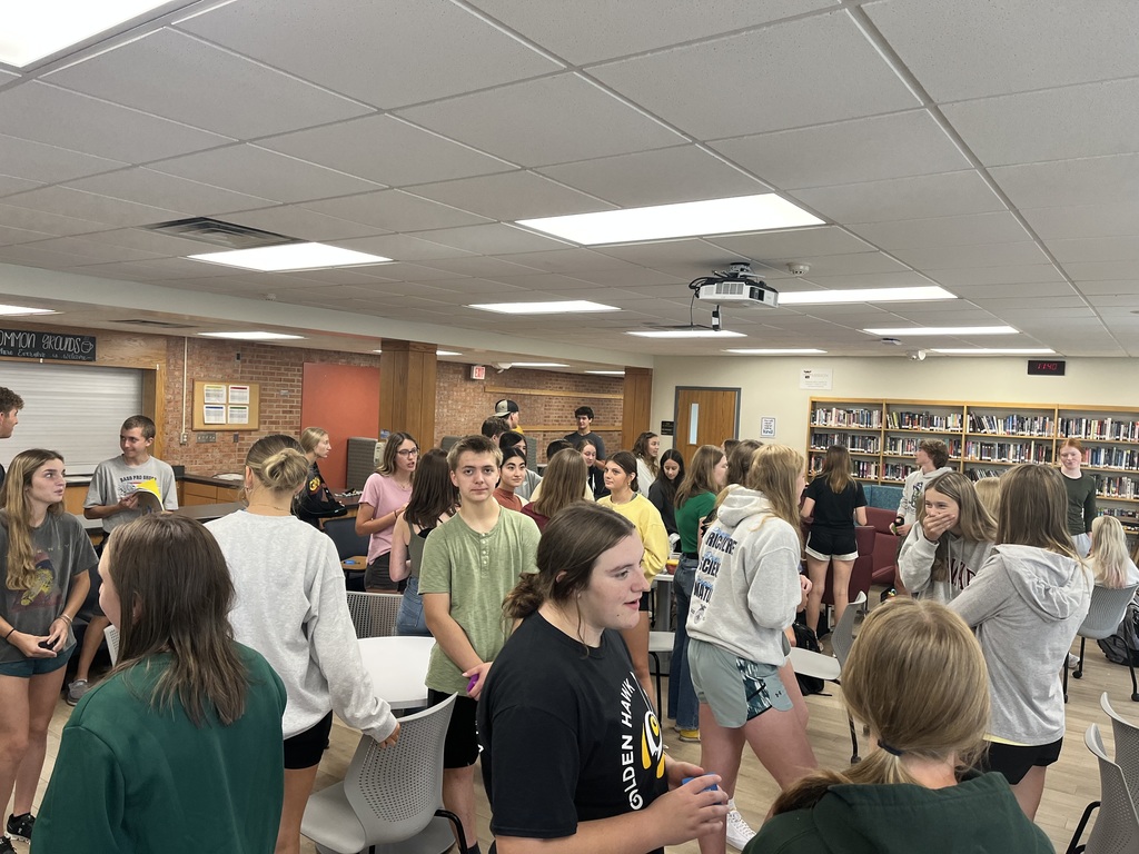 Students meeting in the library