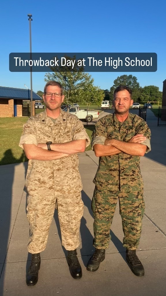 Two male educators in Marine camo