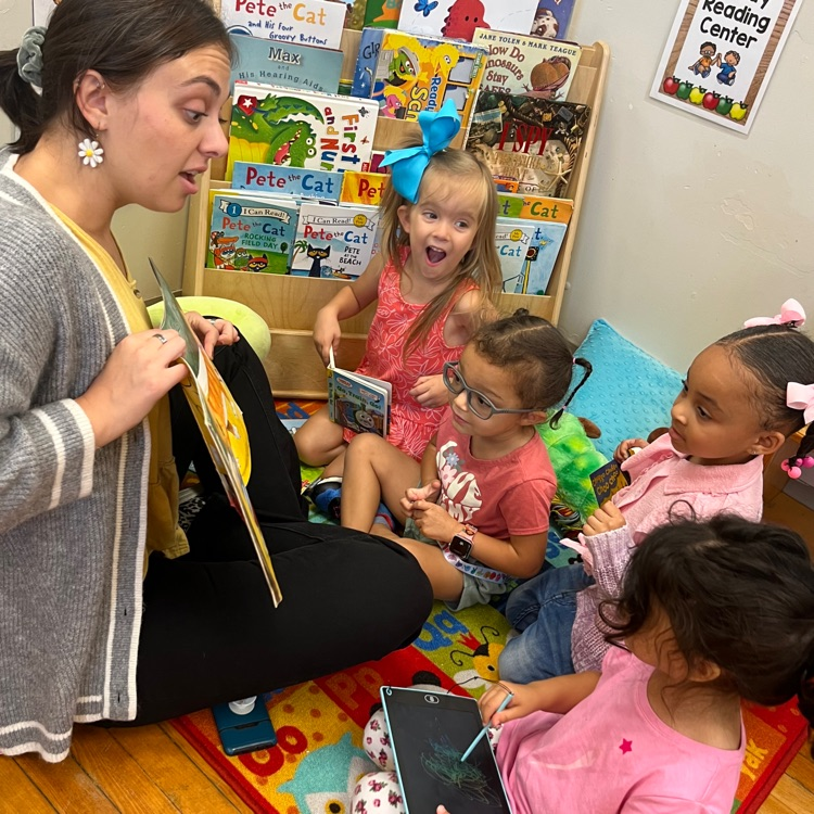 Ms. Meg reading to Ms. Brynn’s class