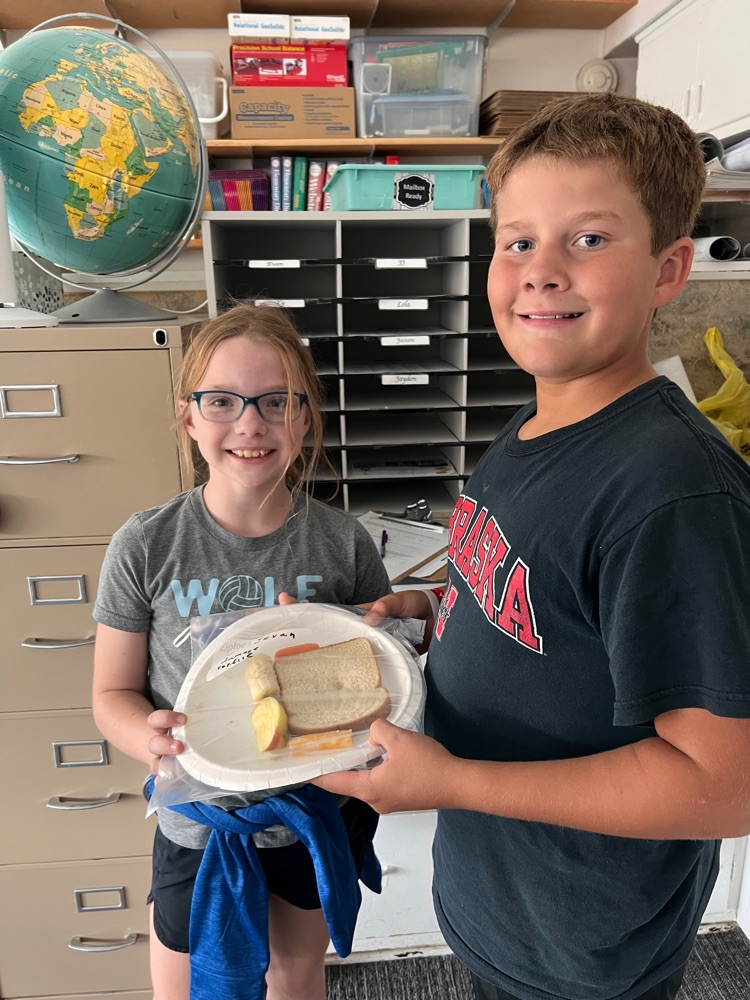 Jayden and Evan testing to see if puncturing the food will speed up the mold process