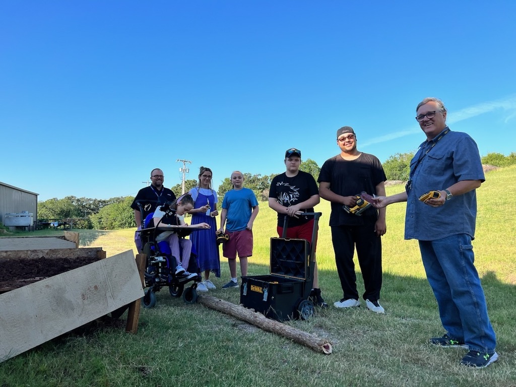 High school Life Skills students learning real world woodworking skills.
