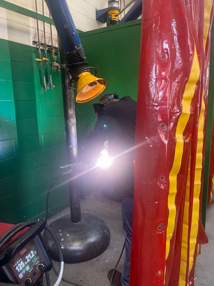 student welding