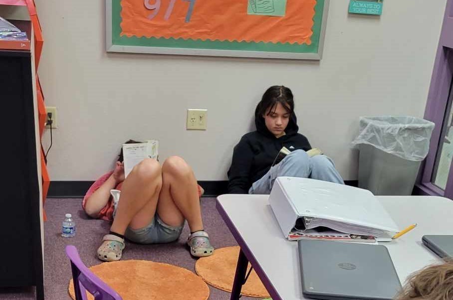Students reading in floor