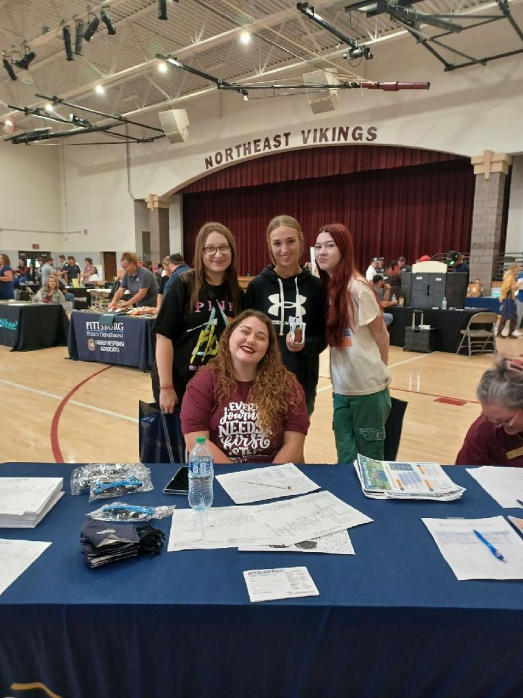 Kathleen Cook, our ICC Outreach para with students at the Career Fair.